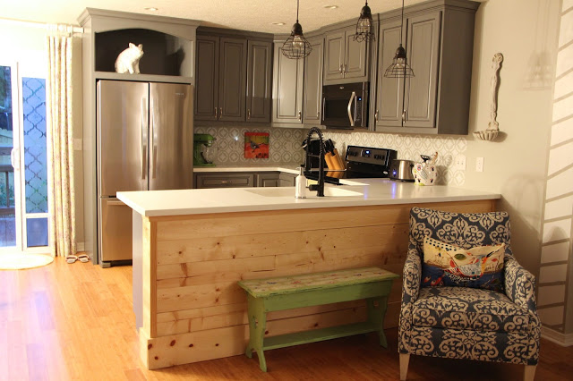 kitchen with gray cabinets and white countertops